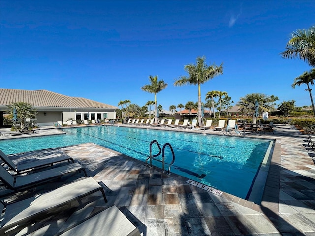 view of pool featuring a patio