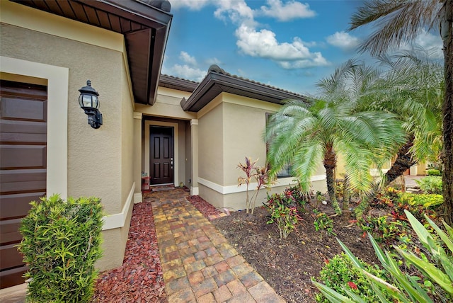 property entrance with a garage