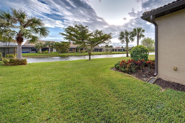 view of yard with a water view