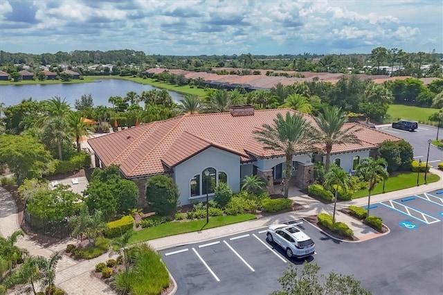 drone / aerial view with a water view