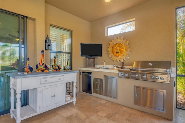 interior space featuring wet bar and fridge