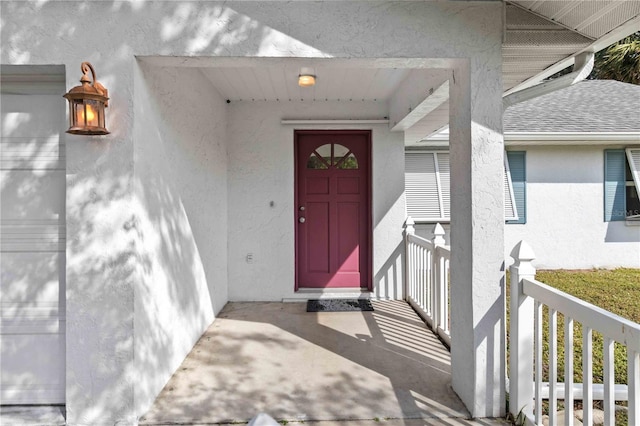 entrance to property with a porch