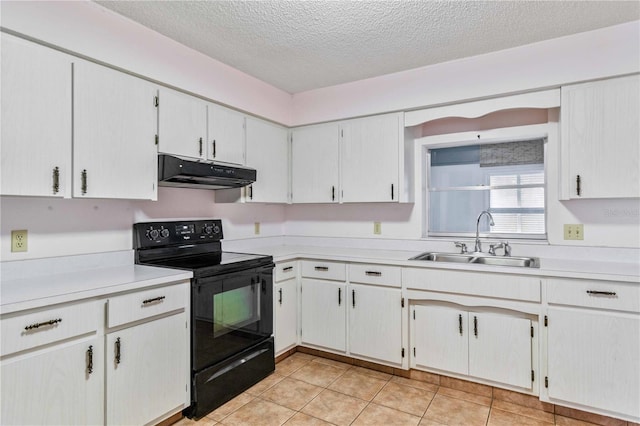 kitchen with white cabinetry, electric range, sink, a textured ceiling, and light tile patterned floors