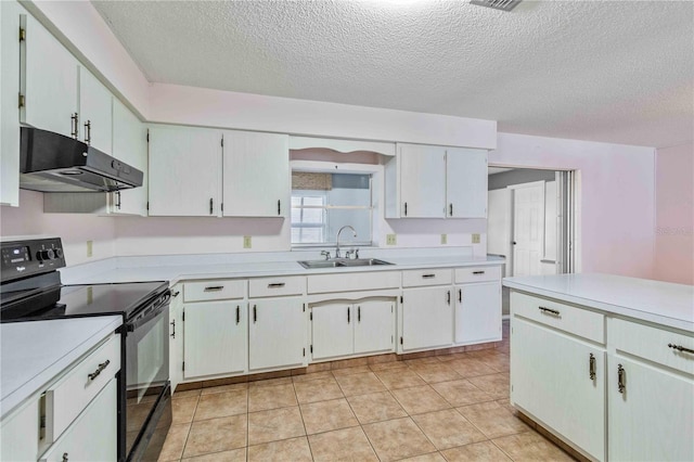 kitchen featuring white cabinetry, black electric range, light tile patterned flooring, and sink