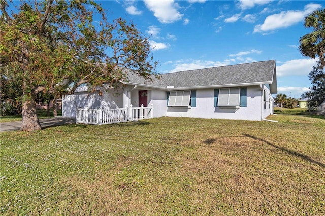 ranch-style home with a front yard