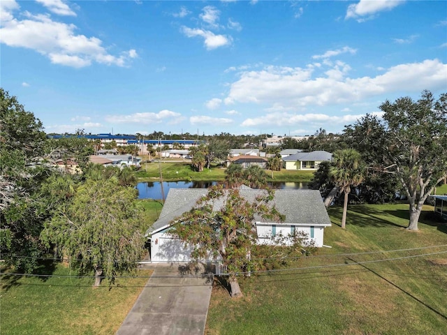 bird's eye view with a water view