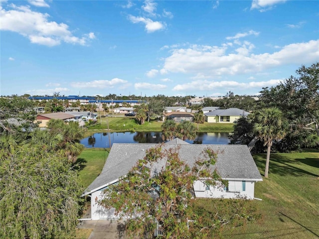 bird's eye view with a water view