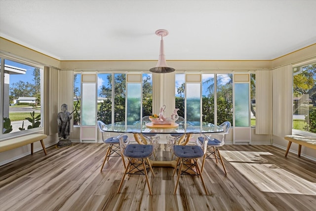 sunroom / solarium featuring plenty of natural light