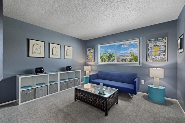 carpeted living room featuring a textured ceiling