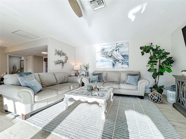 living room featuring ceiling fan