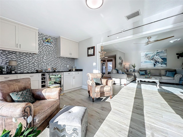 living room with light hardwood / wood-style flooring