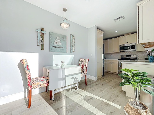 dining room featuring light hardwood / wood-style floors