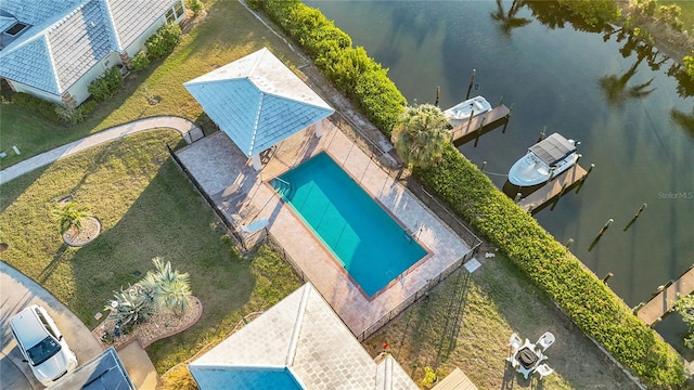 birds eye view of property featuring a water view