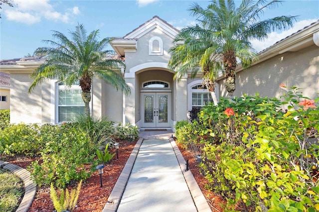 doorway to property featuring french doors