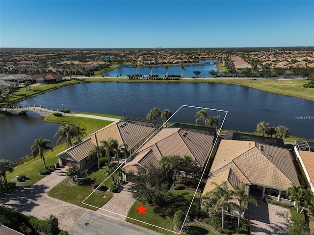 drone / aerial view with a water view