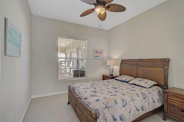 bedroom featuring ceiling fan and light colored carpet