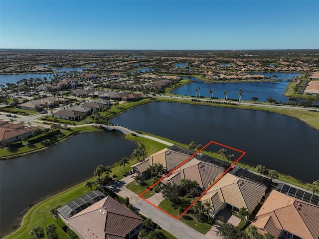 drone / aerial view with a water view