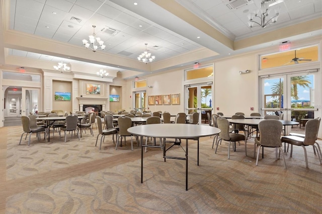 dining space featuring carpet flooring, french doors, ceiling fan, and ornamental molding