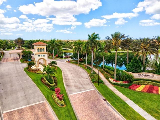 surrounding community featuring a water view