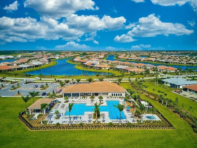 drone / aerial view with a water view