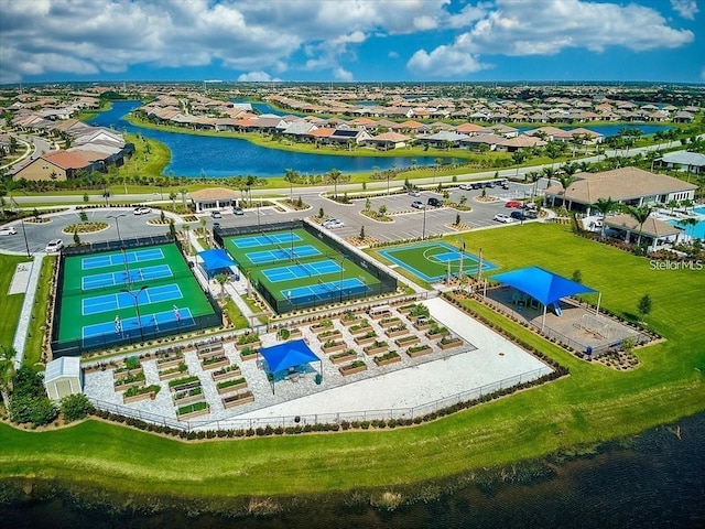 drone / aerial view with a water view