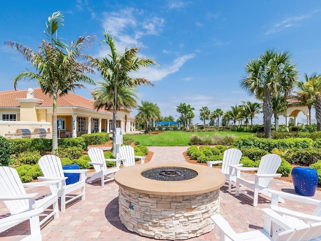 view of patio / terrace featuring a fire pit