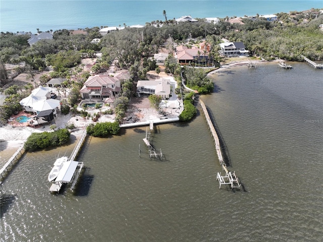 drone / aerial view featuring a water view