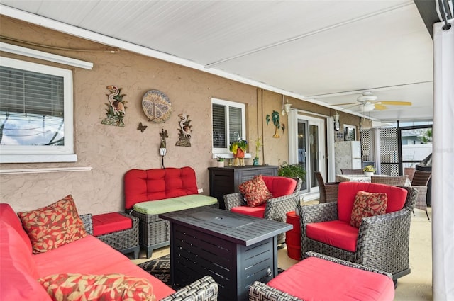 view of patio / terrace featuring an outdoor living space and ceiling fan