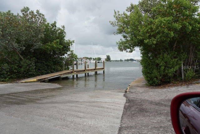 view of dock with a water view