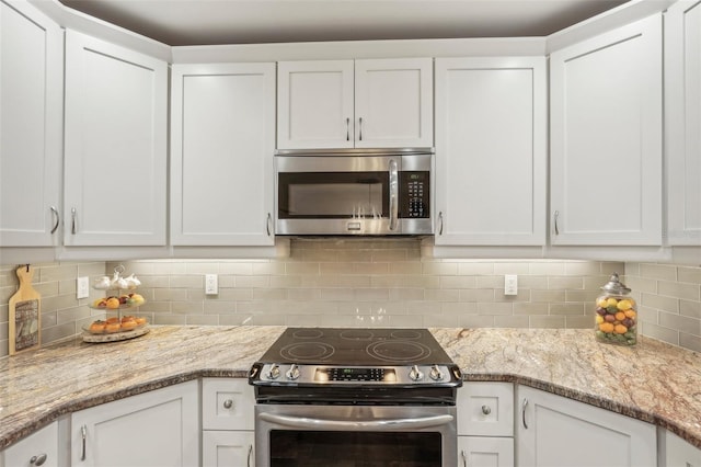 kitchen featuring white cabinets and stainless steel appliances