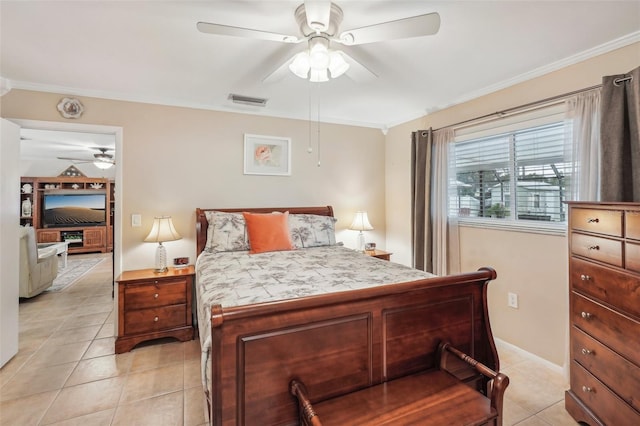 tiled bedroom with ceiling fan and ornamental molding