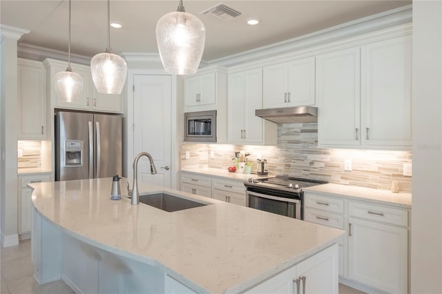 kitchen featuring white cabinetry, sink, a kitchen island with sink, and appliances with stainless steel finishes