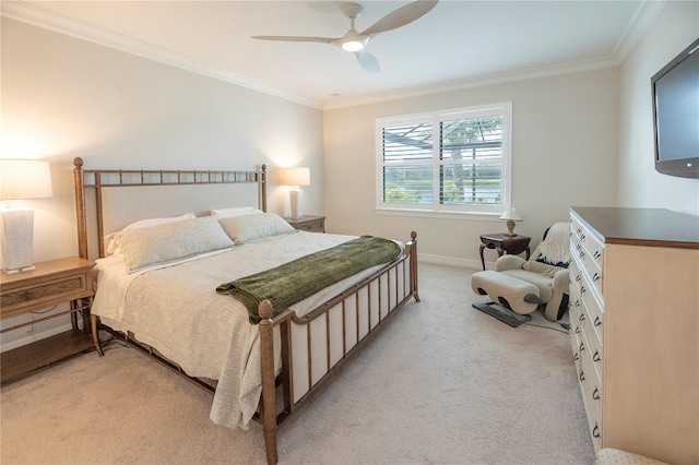 bedroom with ceiling fan, light carpet, and ornamental molding