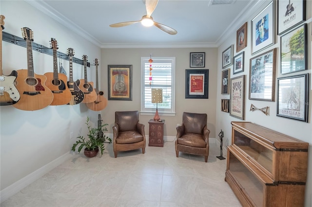 living area featuring ceiling fan and crown molding