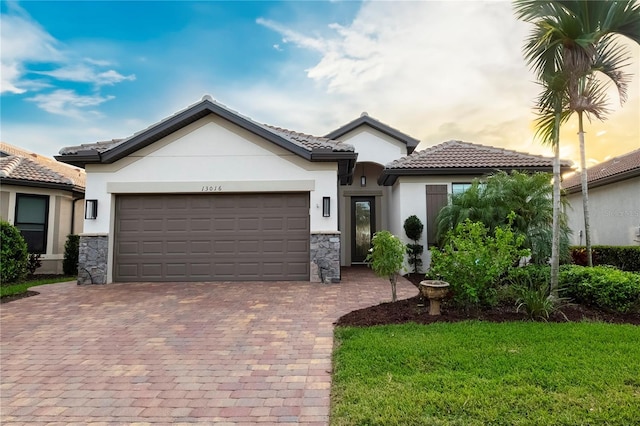 view of front of home with a garage