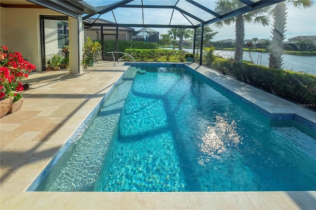 view of pool with a lanai, a water view, and a patio