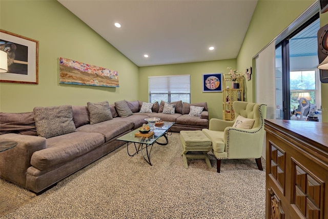 living area with lofted ceiling, carpet, and recessed lighting