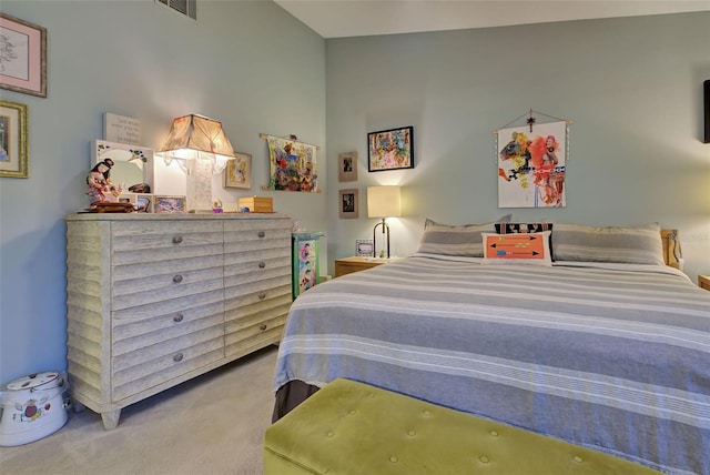 bedroom featuring carpet floors and visible vents