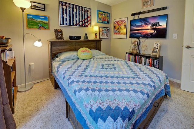 bedroom featuring baseboards and speckled floor