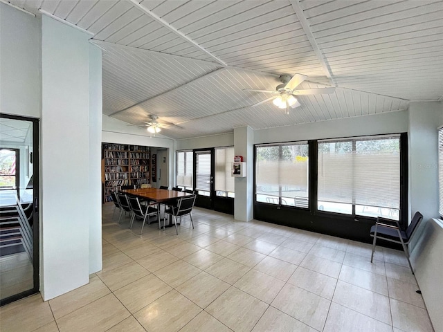 dining space featuring wooden ceiling, light tile patterned floors, and ceiling fan