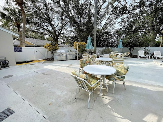 view of patio / terrace with fence