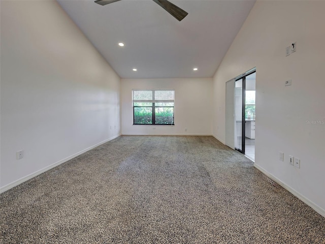carpeted spare room featuring recessed lighting, a ceiling fan, lofted ceiling, and baseboards