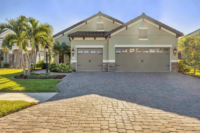 view of front of property with a garage