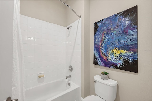 bathroom with shower / bath combination with curtain and toilet