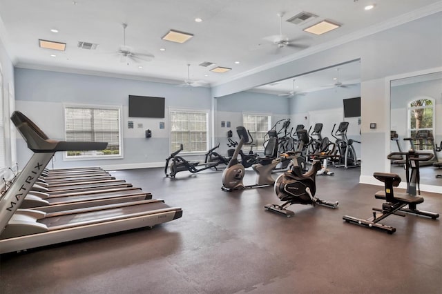 gym with ceiling fan and crown molding