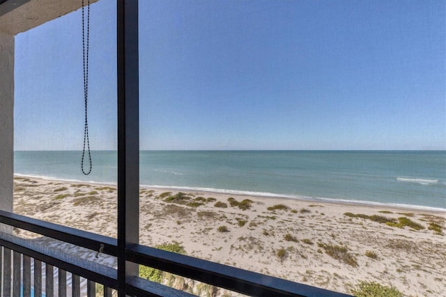 property view of water featuring a beach view