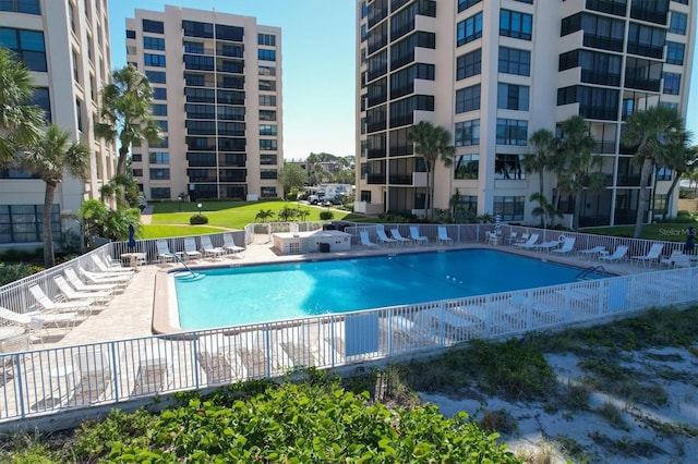 view of swimming pool featuring a patio