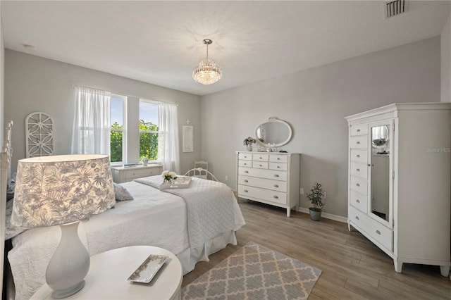 bedroom featuring wood-type flooring