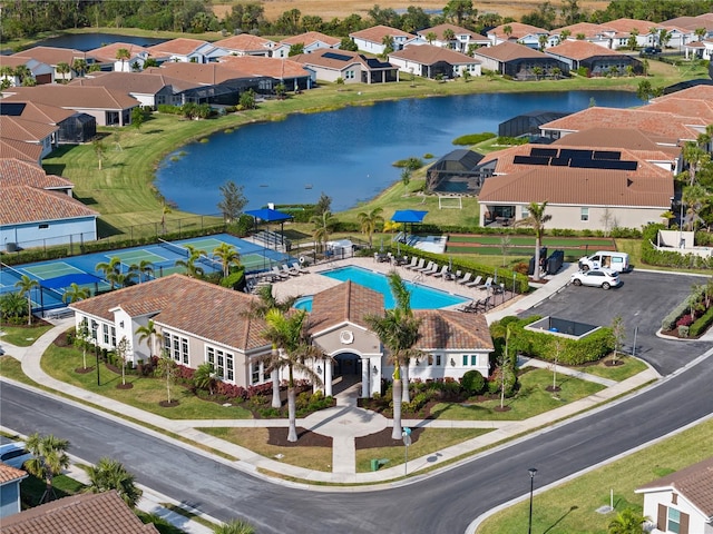 aerial view featuring a water view and a residential view