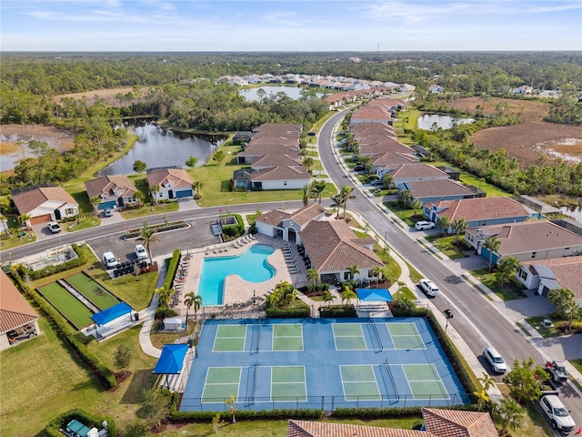 aerial view featuring a water view and a residential view